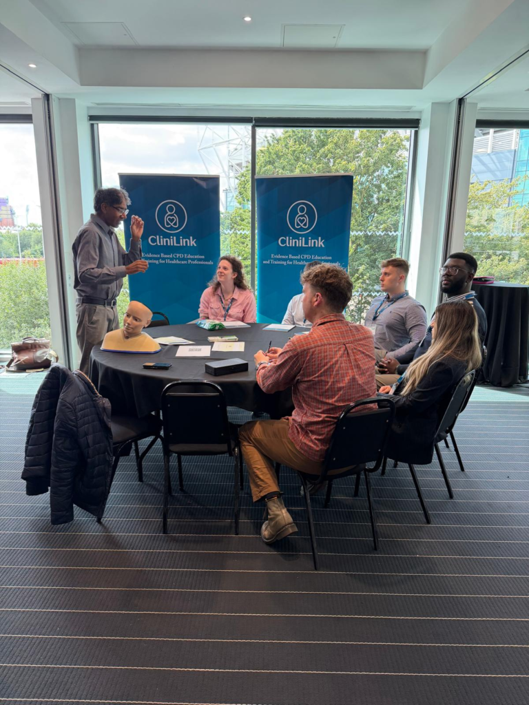 Small-group teaching with an anatomical model at a previous CliniLink clinical skills workshop